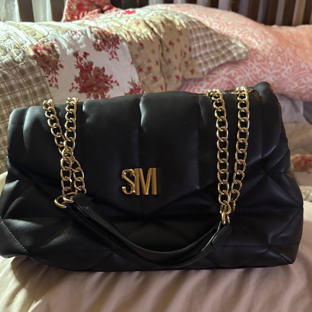 Black Quilted Chain Shoulder Bag
STEVE MADDEN